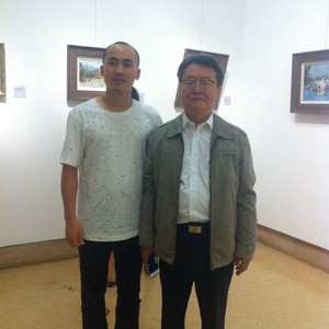 著名学者肖云儒与画家刘文文合影并深切交谈。